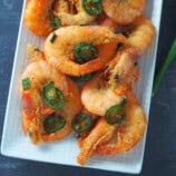 Salt and Pepper Shrimp on a white rectangular serving platter.