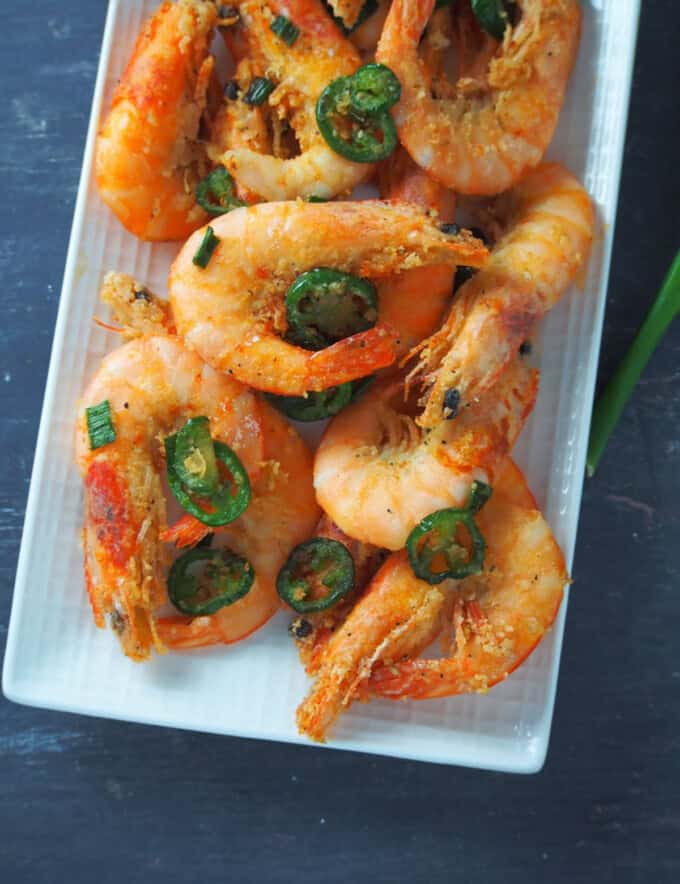 Salt and Pepper Shrimp on a white rectangular serving platter.