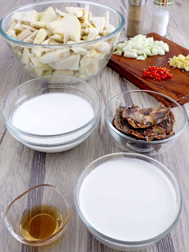 sliced green jackfruit, coconut milk, fish sauce, onions, garlic, chili peppers, dried fish