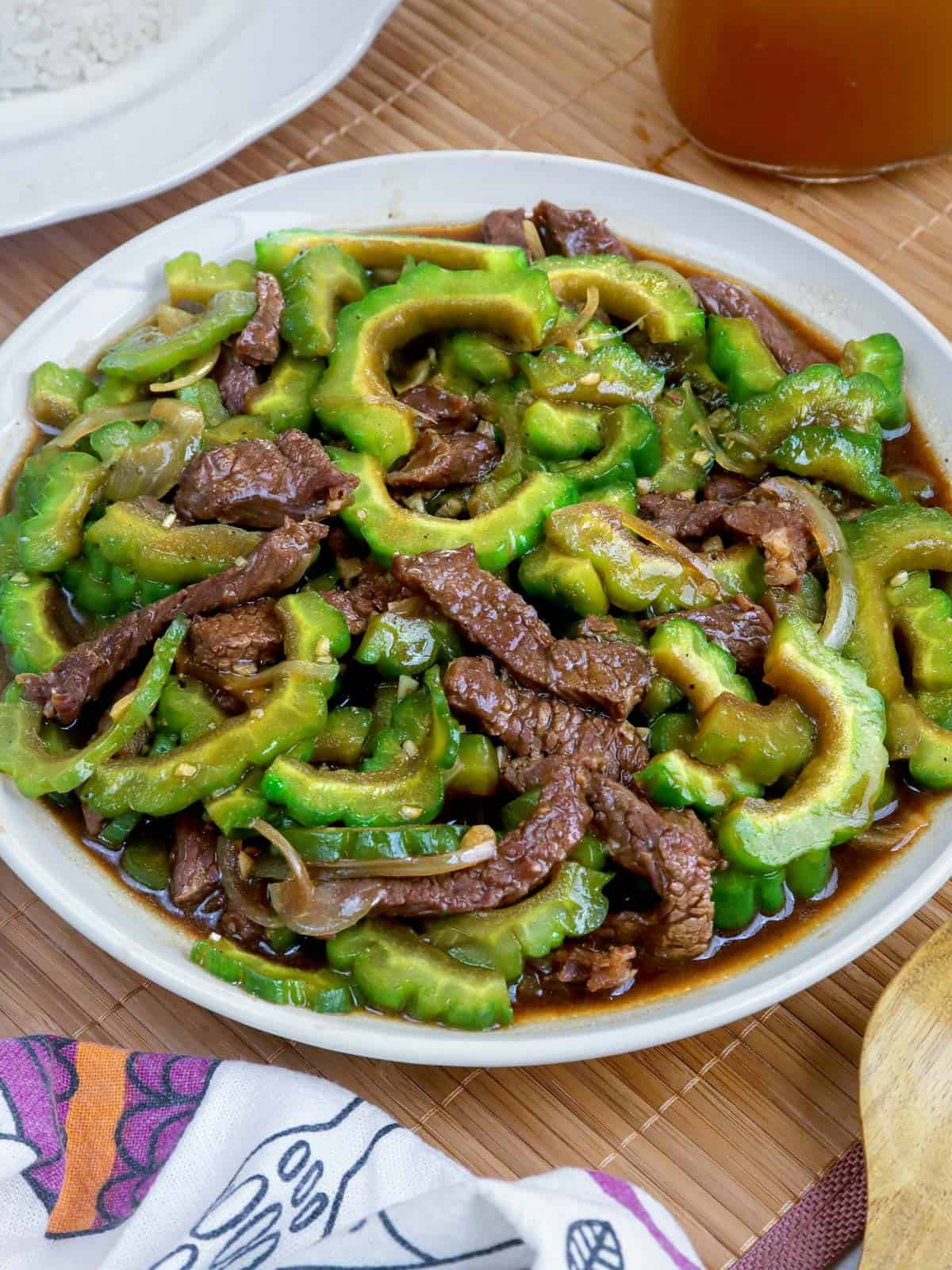 Ampalaya con Carne in a white bowl.