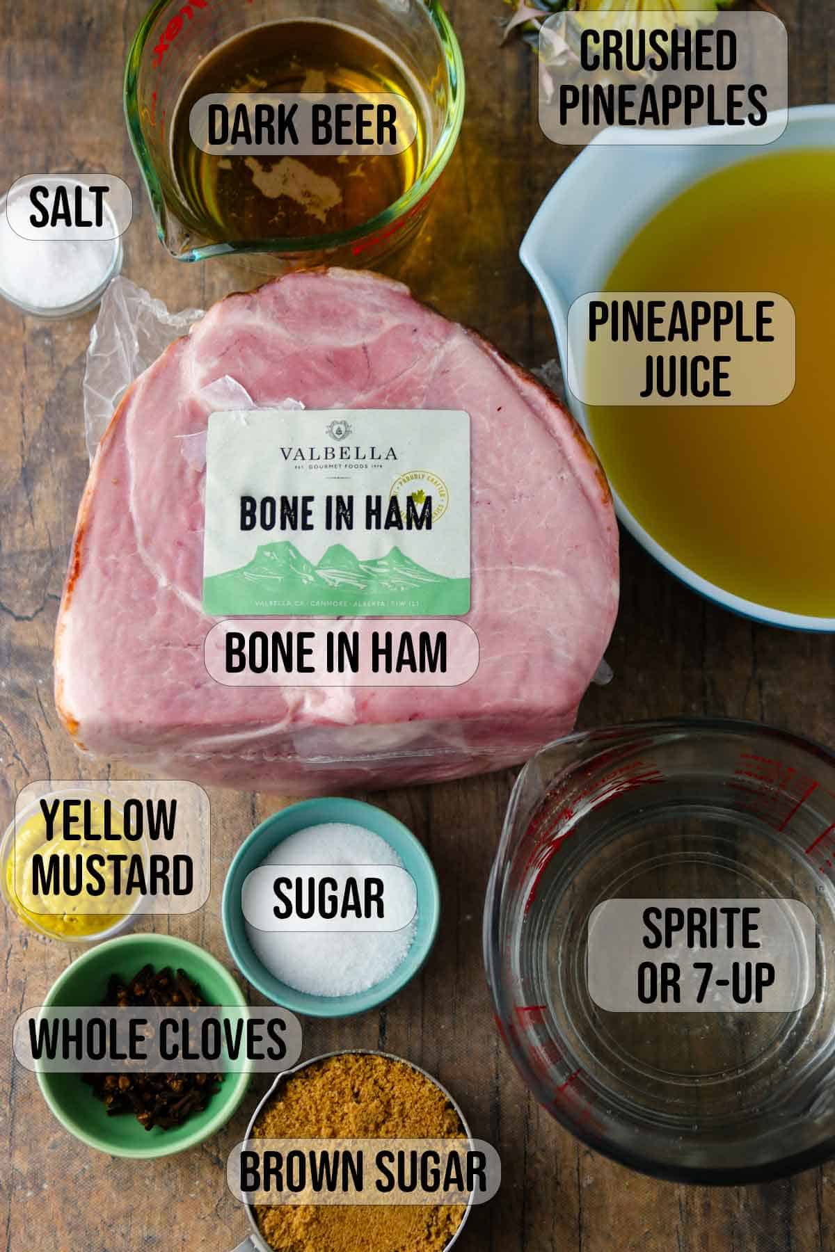 bone in ham, pineapple juice, Sprite, cloves, yellow mustard, sugar, salt in bowls.