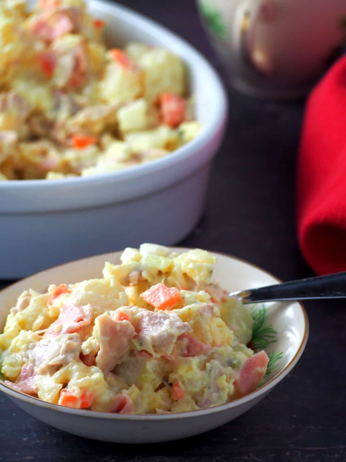 Filpino-style potato salad on a serving bowl.