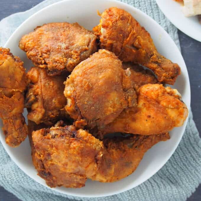 Crispy Fried Chicken on a white serving platter.