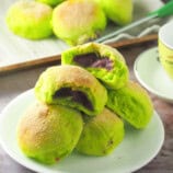 Pandan Pandesal with Ube Halaya Filling on a white plate.