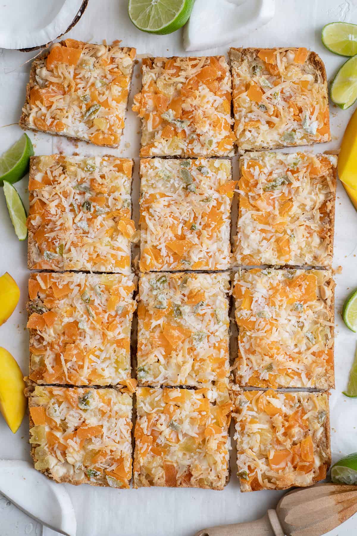 sliced magic cookie bars with tropical flavor.