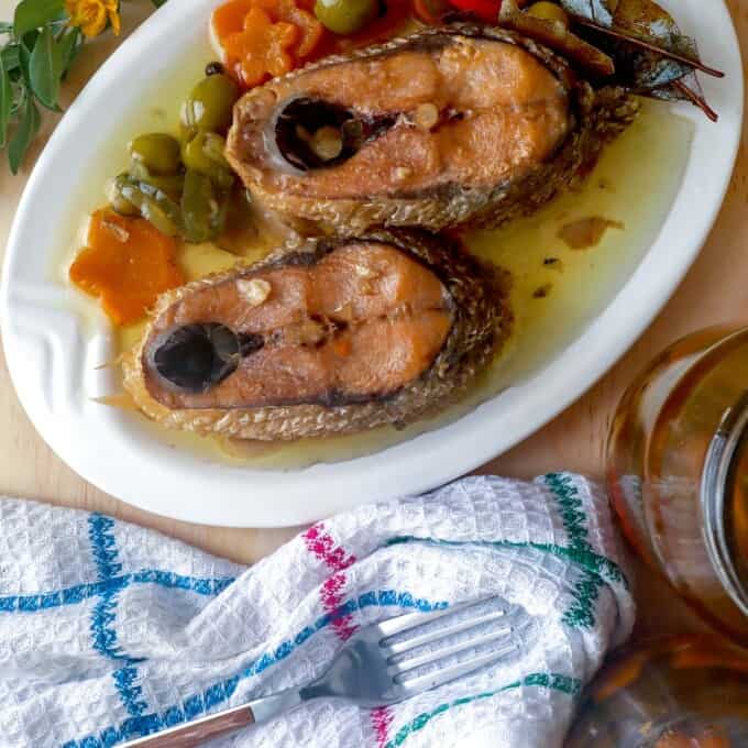 Spanish-style Sardines Bangus in Oil on a serving platter.