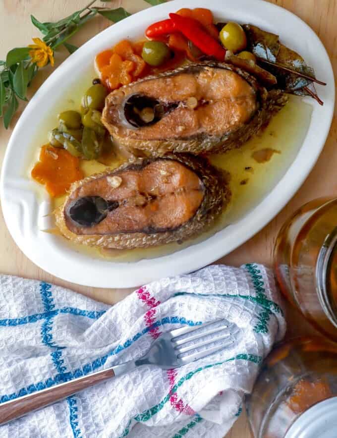 Spanish-style Sardines Bangus in Oil on a serving platter.