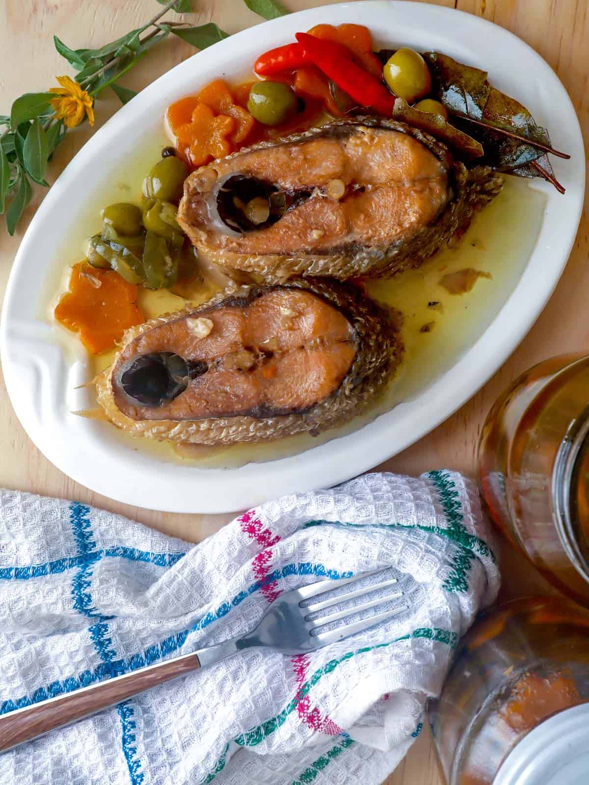 Spanish-style Sardines Bangus in Oil on a serving platter.