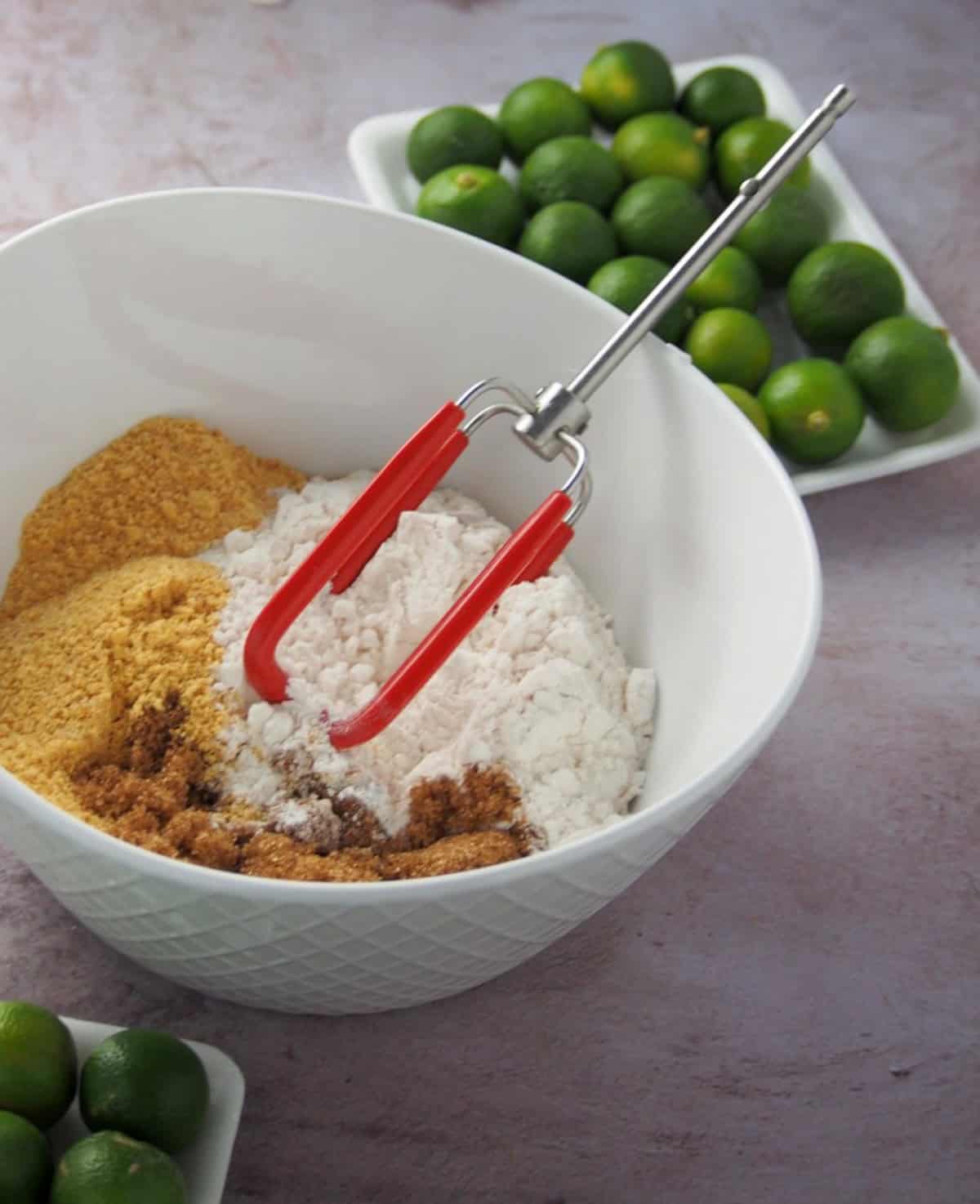 calamansi fruit, mixing bowl with brown sugar, graham cracckers.