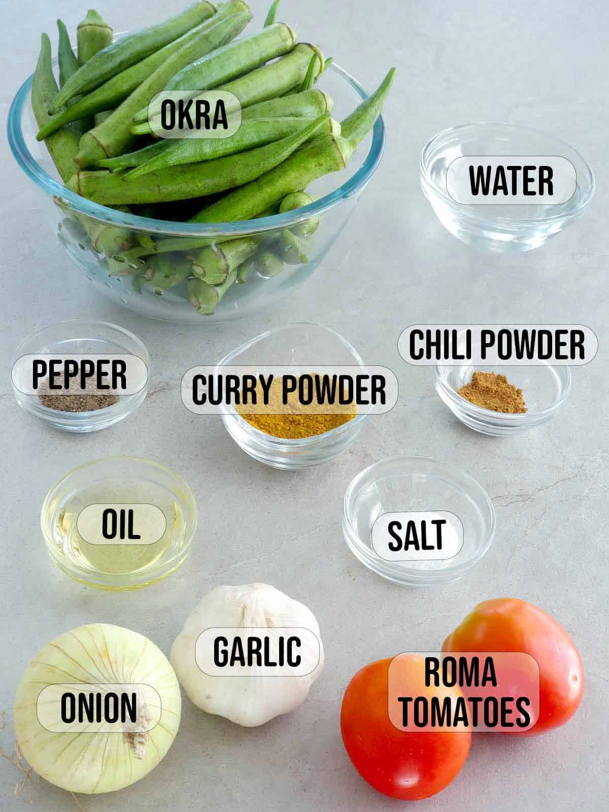 okra, tomatoes, curry powder, onions, garlic, salt, pepper, oil, water.