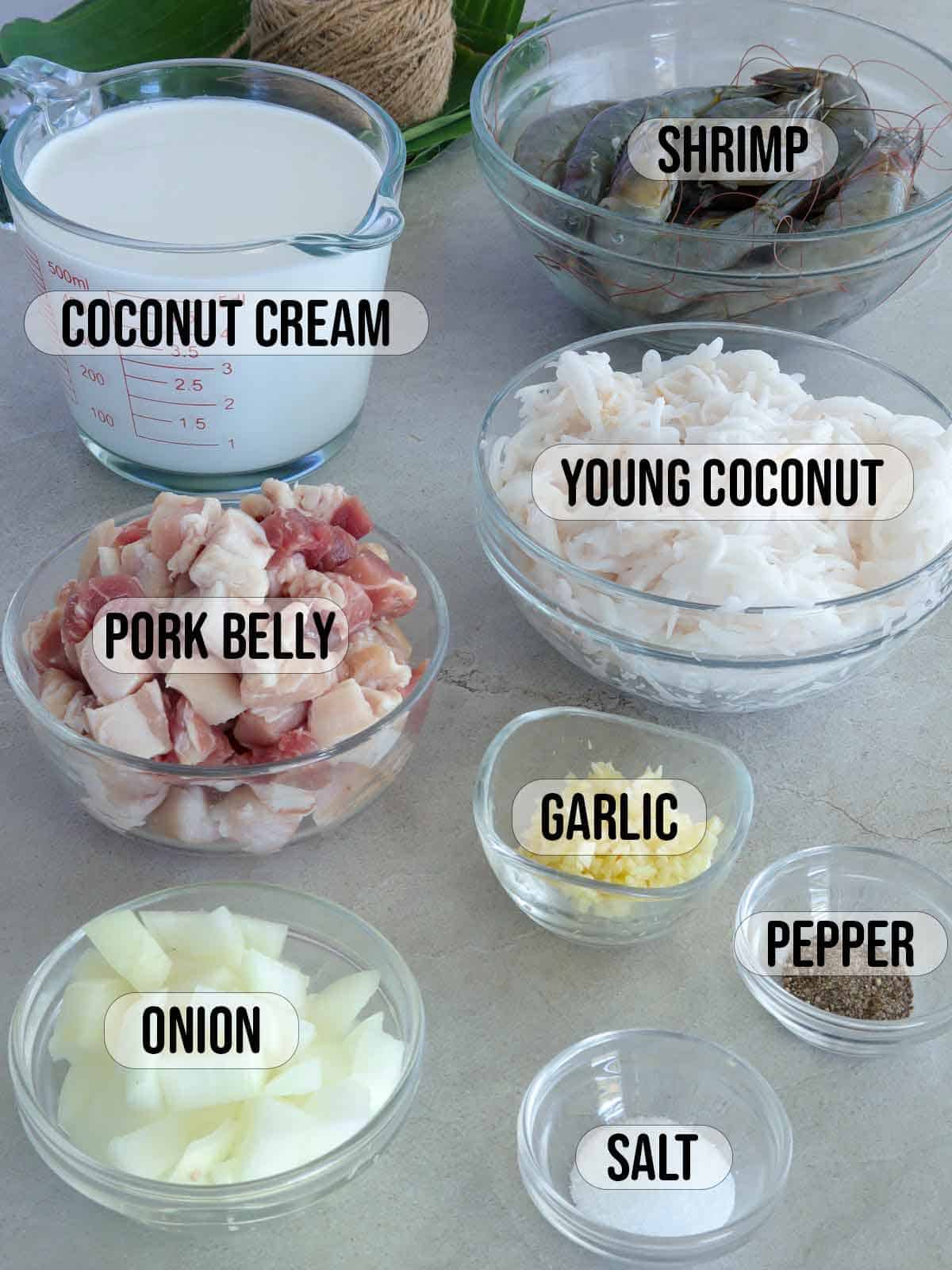 shrimp, pork belly, shredded buko, coconut cream, onions, garlic, pepper, salt, banana leaves, kitchen twine.
