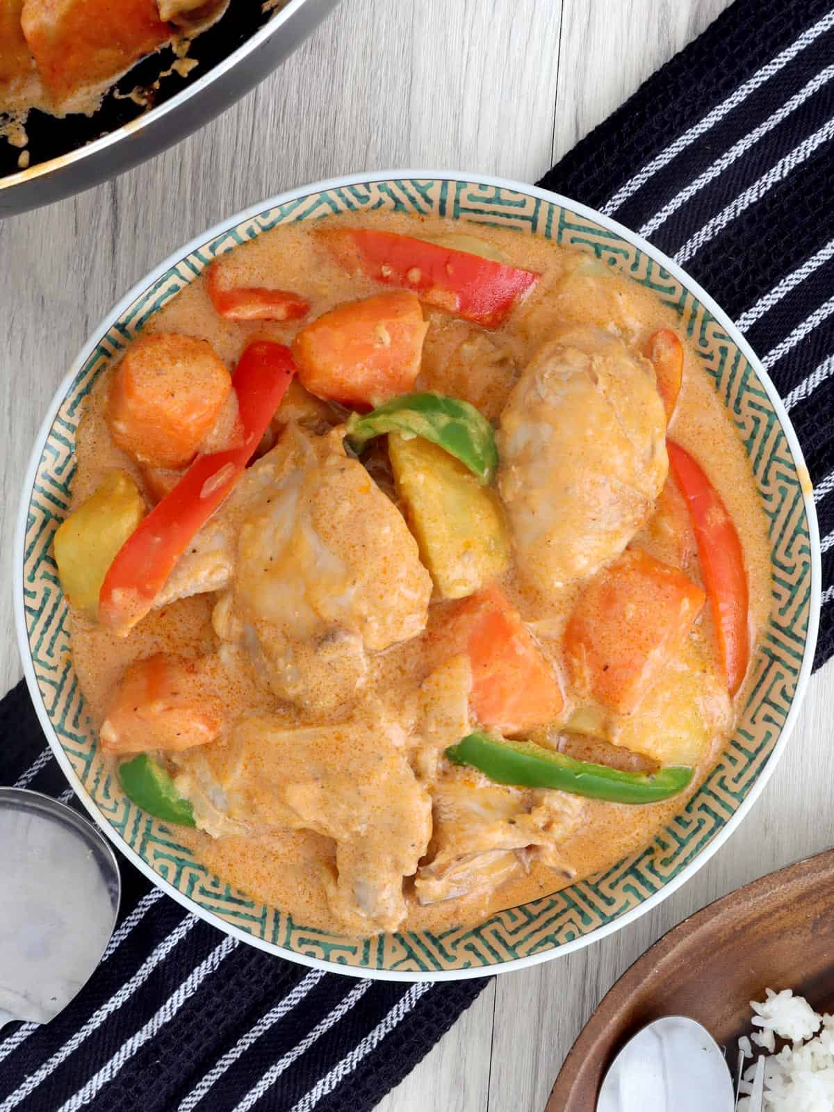 Creamy Chicken Afritada in a serving bowl.