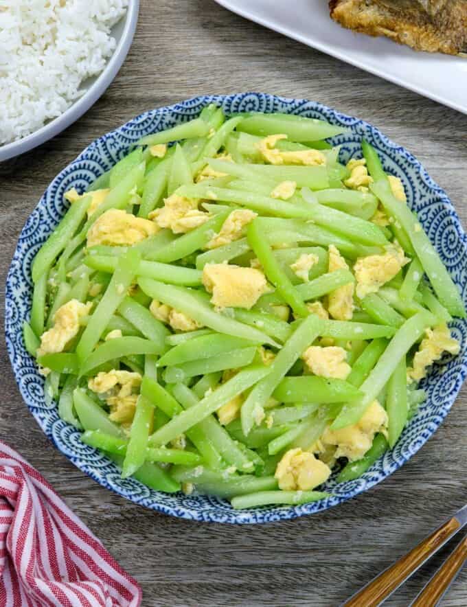 Chayote and Egg Stir-fry in a blue bowl.