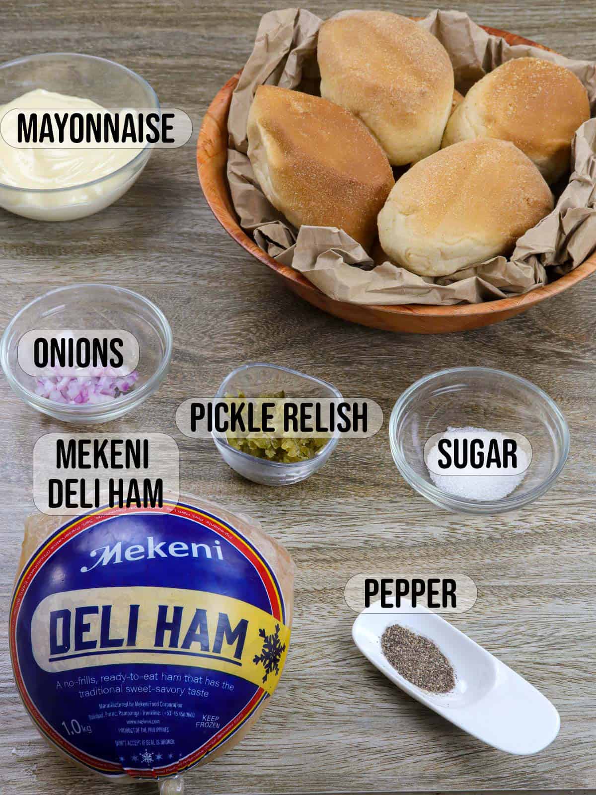 pandesal, onions, mayonnaise, sugar, pepper, pickle relish, ham.